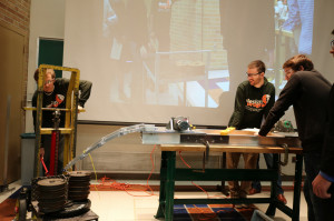 Mechanical Design II students testing their deployable bridge