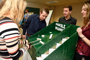 Visitors play Marble Madness, created by Mechanical Design I students