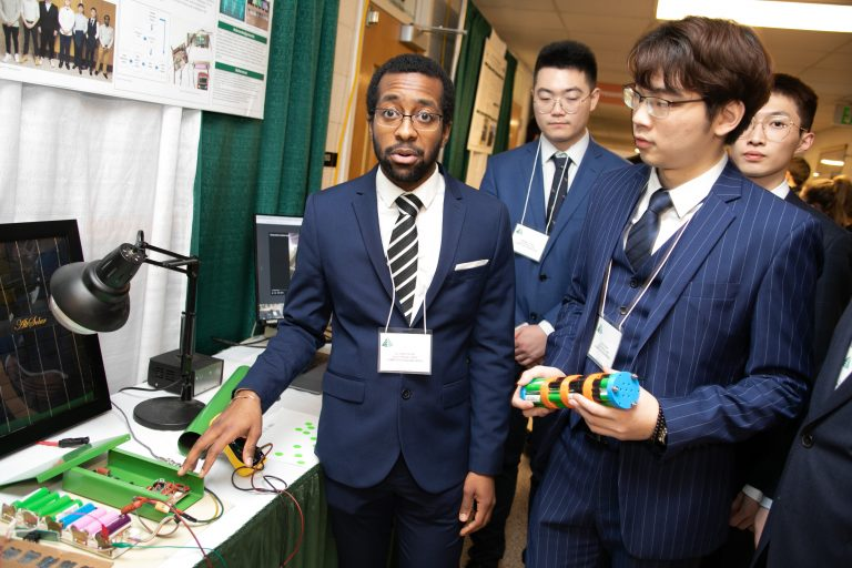 ECE students presenting their Design Day project