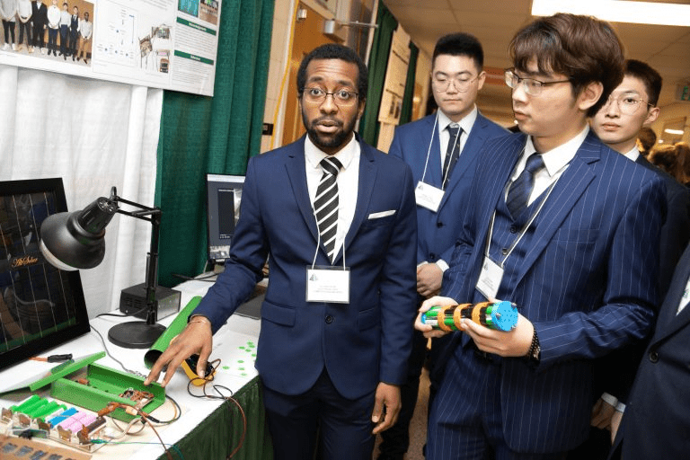 ECE students presenting their Design Day project