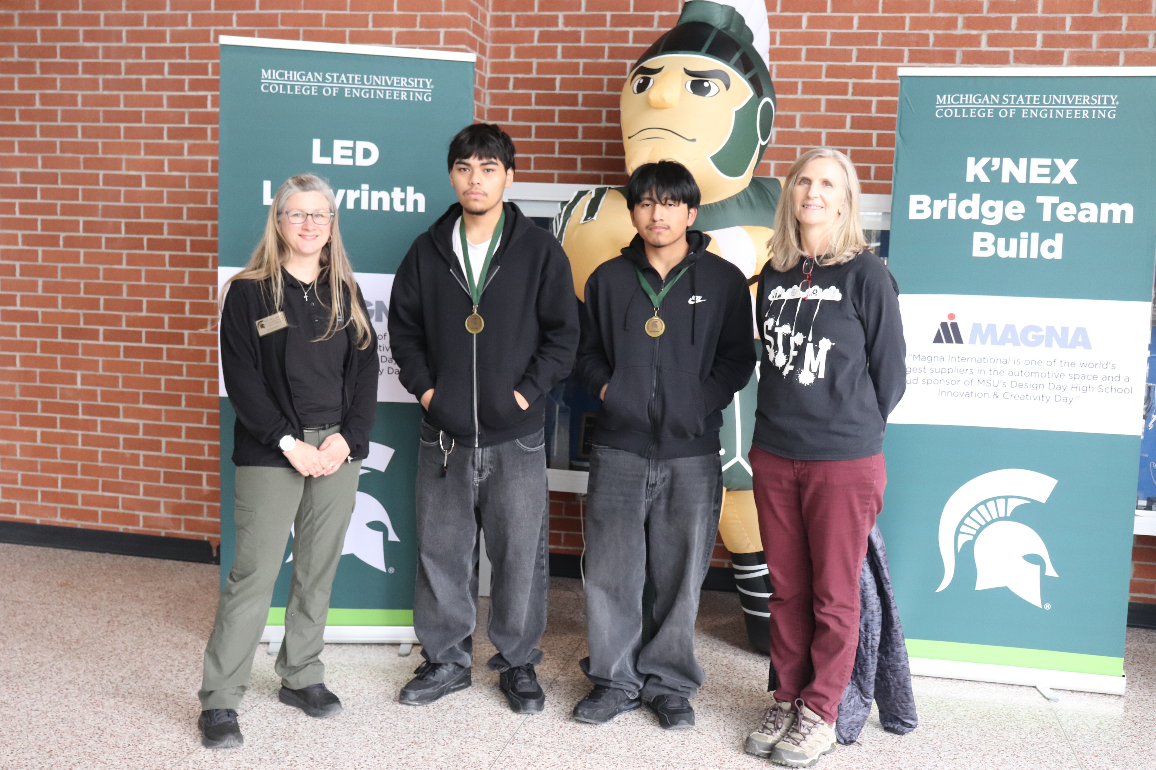 Mauricio and Juan posing with Sparty