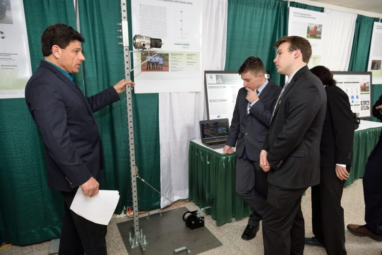 ME students presenting their Design Day project