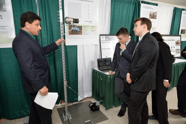 ME students presenting their Design Day project
