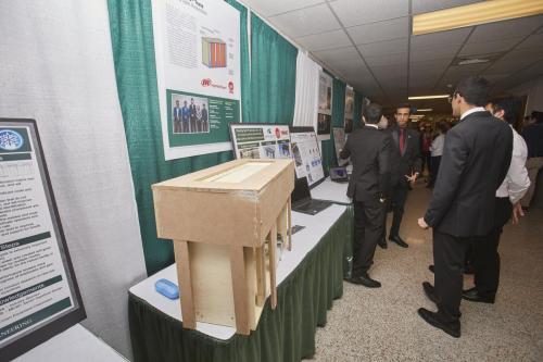 Visitors wander the halls to view all of the capstone project displays