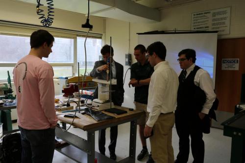 A Heat Transfer team prepares their heat pipe for competition